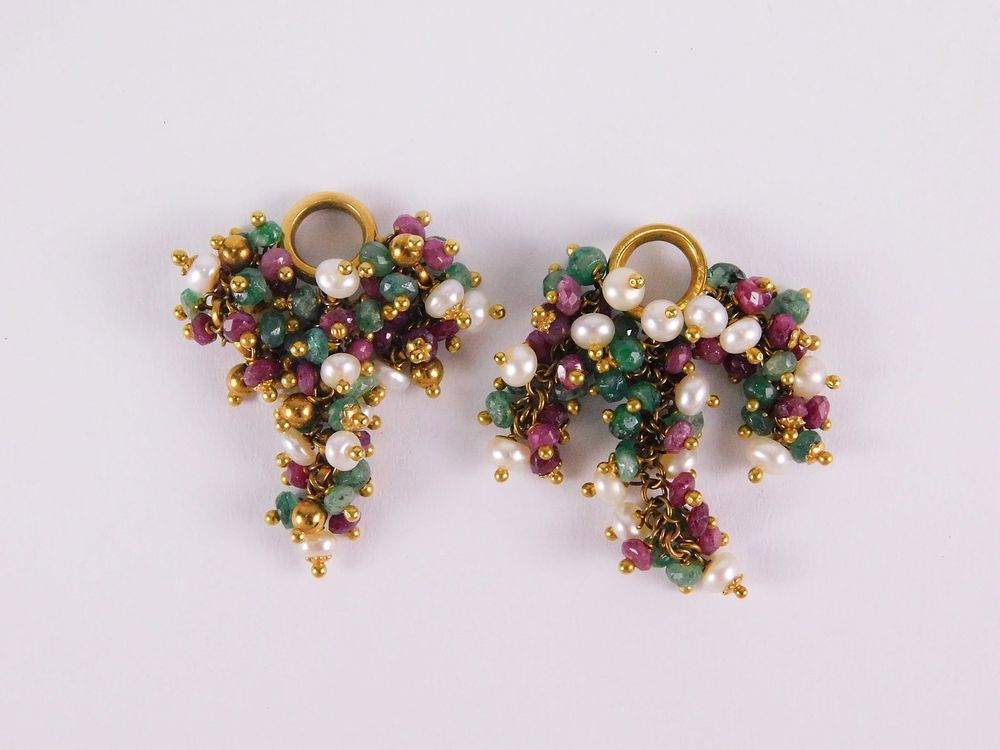 Lot 191: Pair of 18k Earring Charms