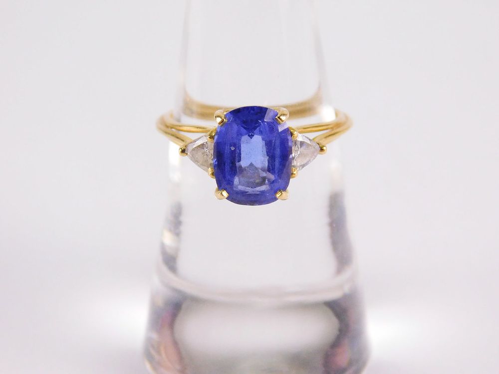 Lot 195: 18k Topaz and Diamond Ring