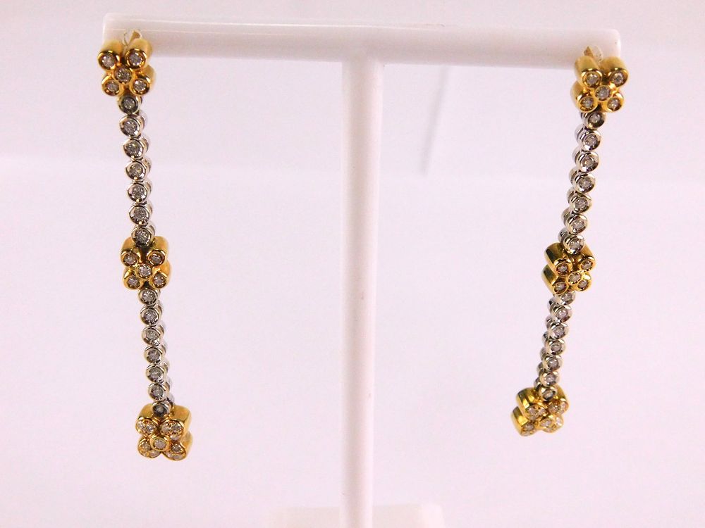 Lot 200: Pair of 18k Yellow and White Gold Drop Earrings
