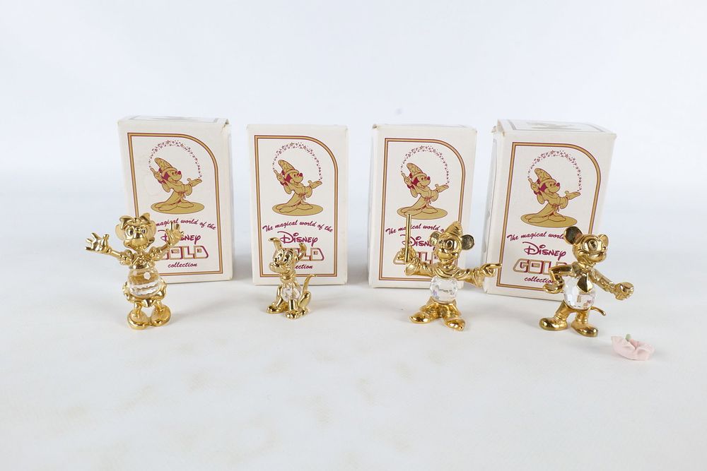 Lot 419: Lot of 4 Disney Lencia Austria 24K Gold Plated and Crystal Figurines