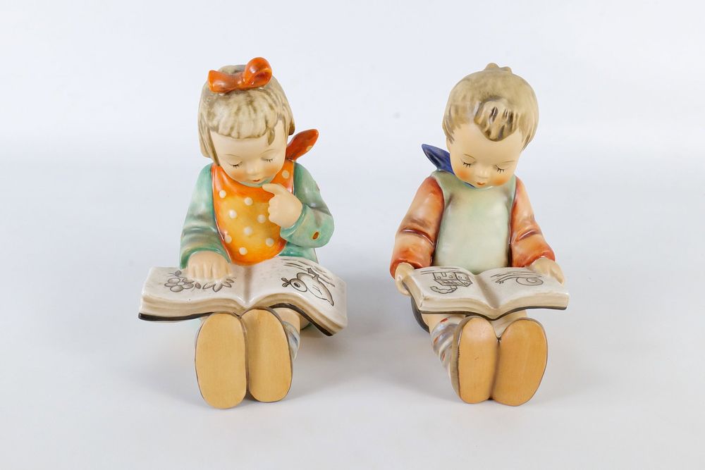 Lot 227: A Pair of Hummel Bookworm Figurines