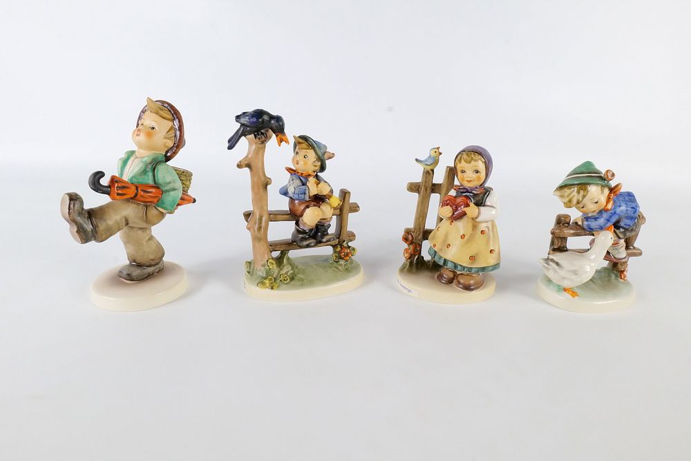 Lot 228: Four Goebel Hummel figurines