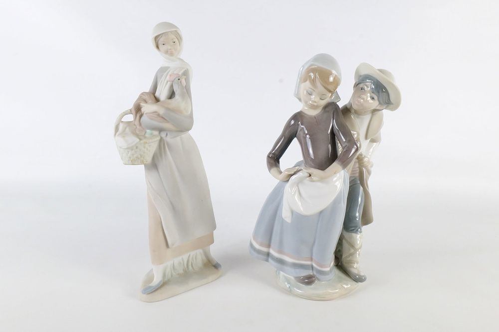 Lot 229: Two  Porcelain Lladro Figurines