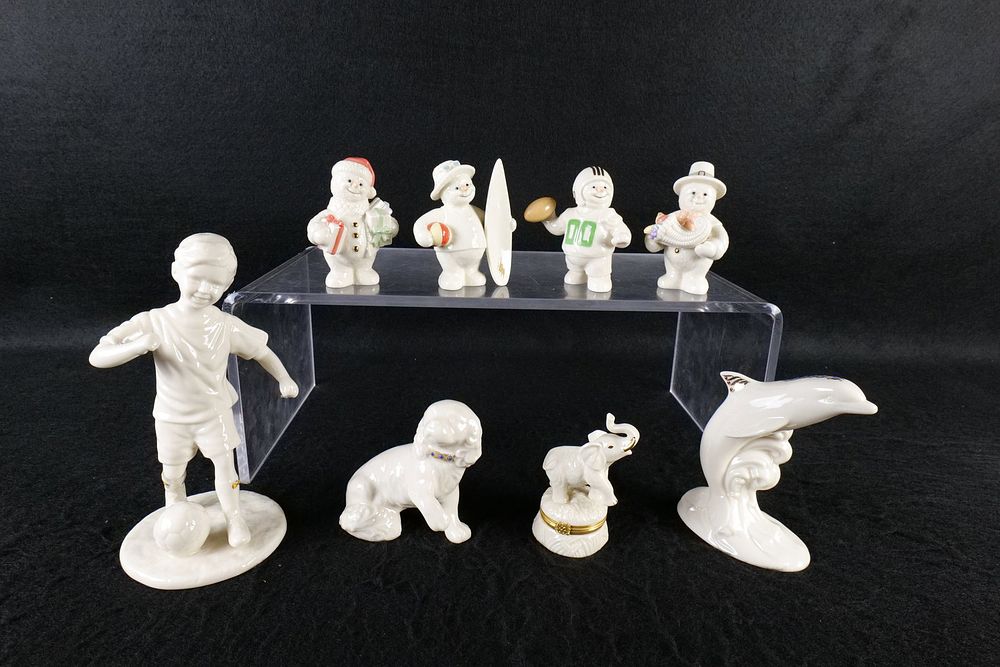 Lot 232: A Collection of Eight Lenox Porcelain Figurines