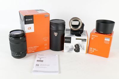 A Collection of Sony Camera Equipment. This Sony collection features a DT 55-300mm lens, an 