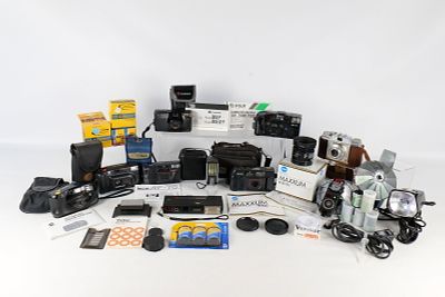 Group Lot of Cameras. A group of vintage film cameras and accessories from makers including 