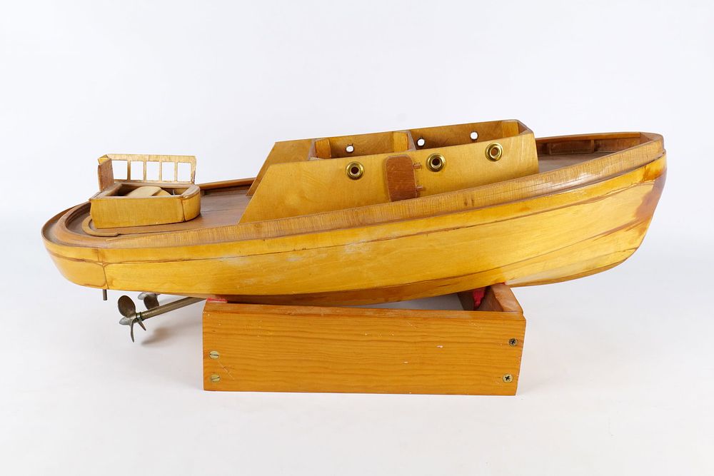 Lot 279: Handmade Wooden Folk Art Boat with Motor