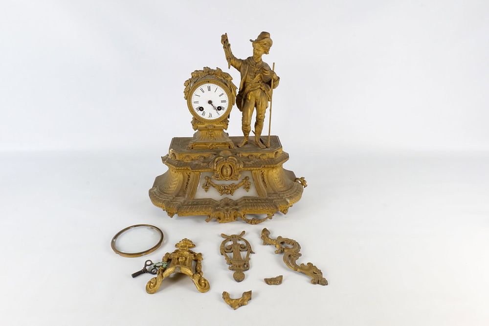 Lot 302: French Figural Gilt Metal and Alabaster Mantel Clock