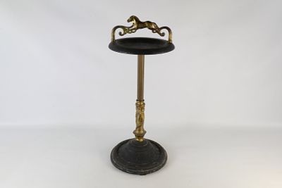 Equestrian Ashtray Stand. Equestrian ashtray stand with fluted column. Measures 26 inches tall. 