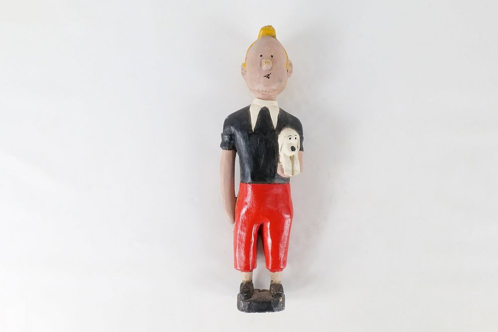Lot 366: Folk Art Hand Carved Wood Tintin figurine