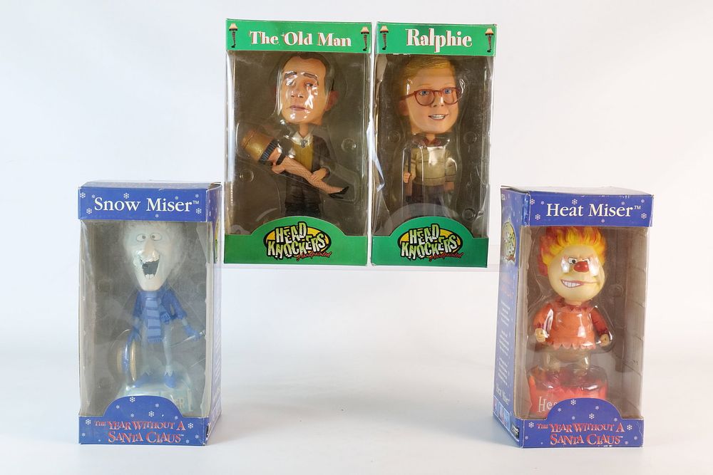 Lot 159: Lot of 4 NECA Holiday Movie Themed Head Knockers