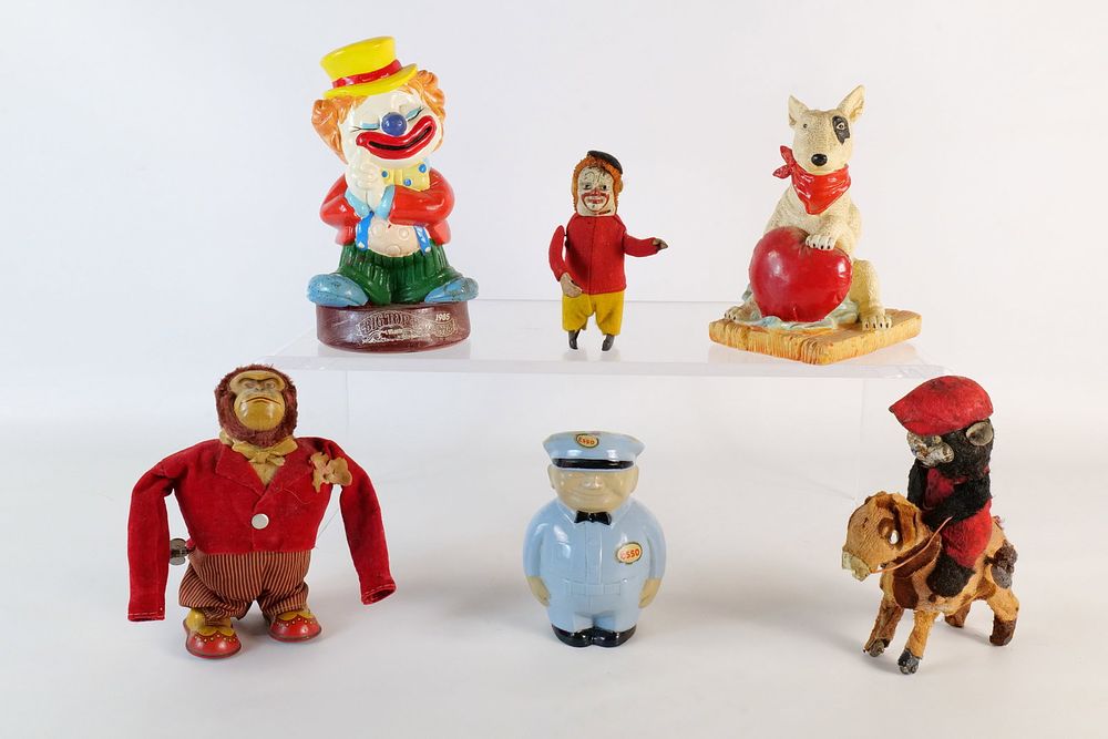 Lot 284: Group Lot of Wind Up Toys and Advertising Collectibles