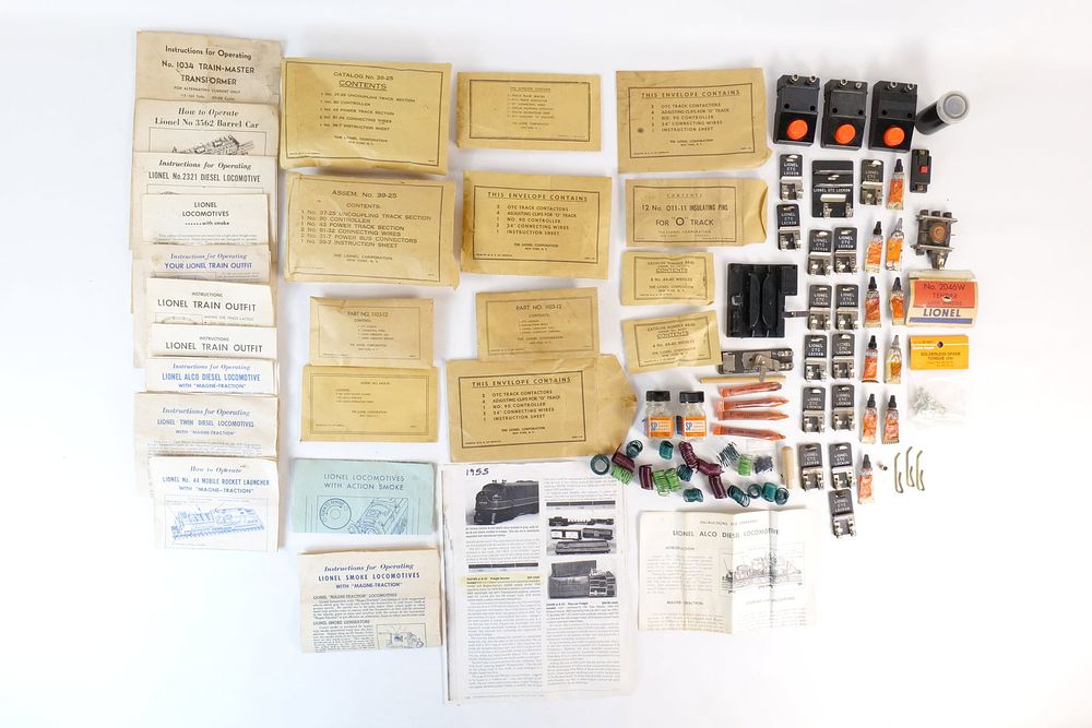 Lot 435: Group Lot of Vintage Lionel 0/27 Postwar Train parts, accessories, and track connectors