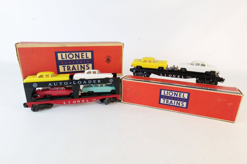 Lot 452: Lot of (2) Vintage Lionel 0/27 Postwar Transport cars in boxes
