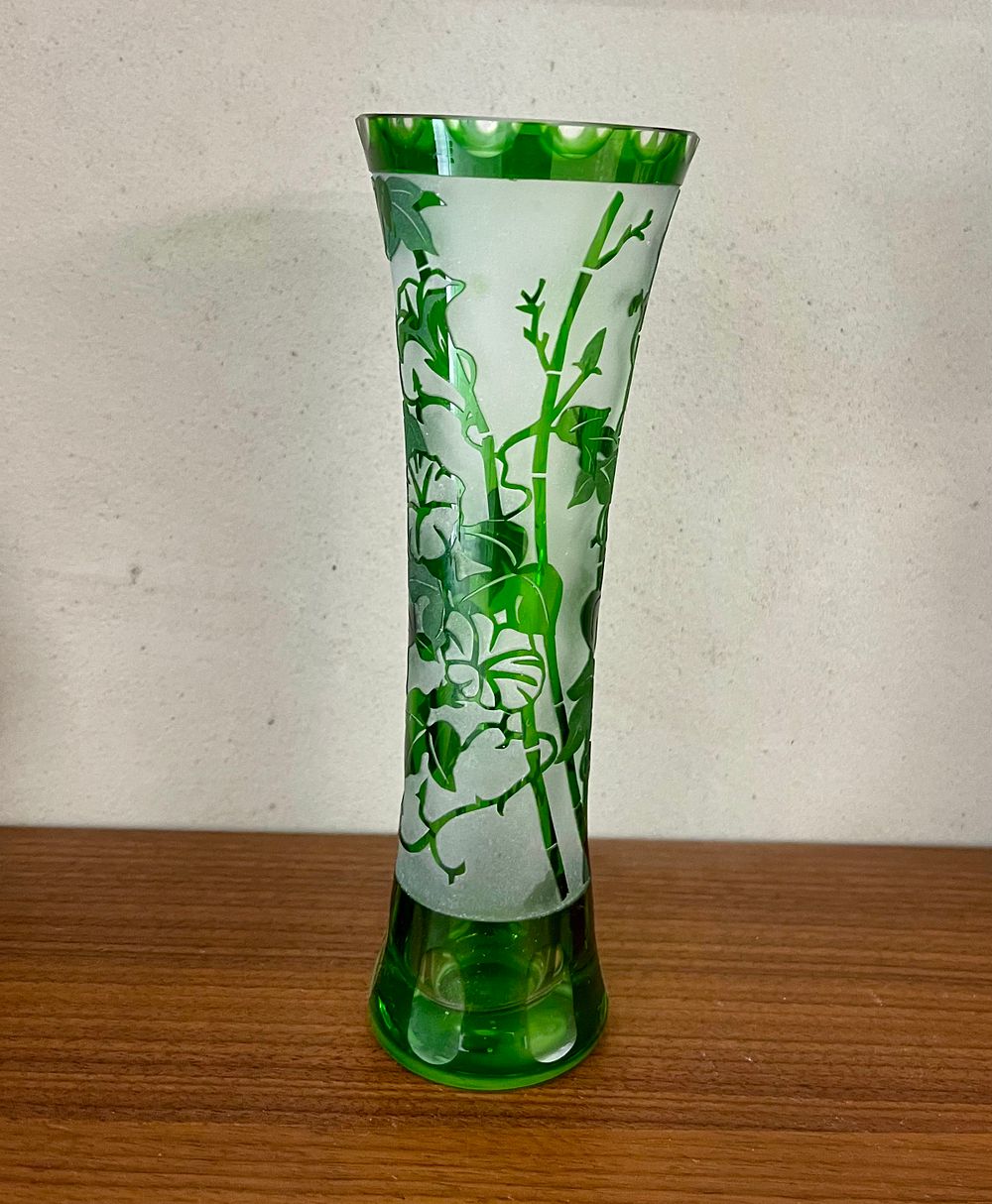 Art Nouveau glass vase in cameo style, decorated with engraved plants in shades of emerald and 