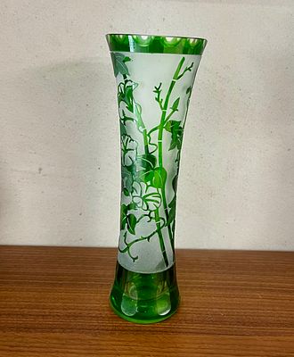 Art Nouveau glass vase in cameo style, decorated with engraved plants in shades of emerald and 