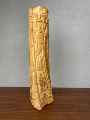 Hand carved statue made of bone, work of an artist.17.5 cm Height