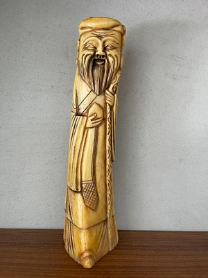 Hand carved statue made of bone, work of an artist. 23 cm Height