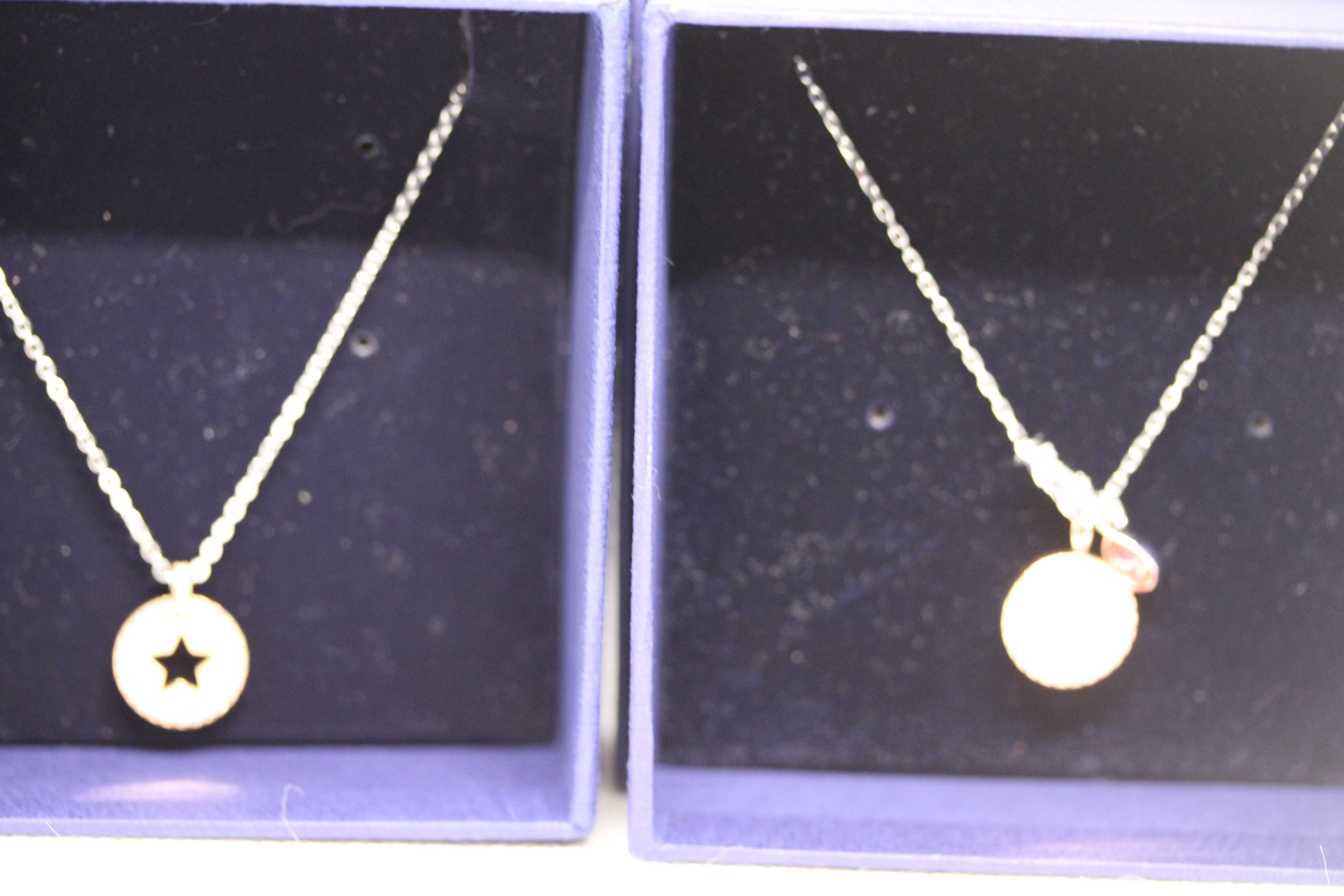 2x Swarovski chains & pendants