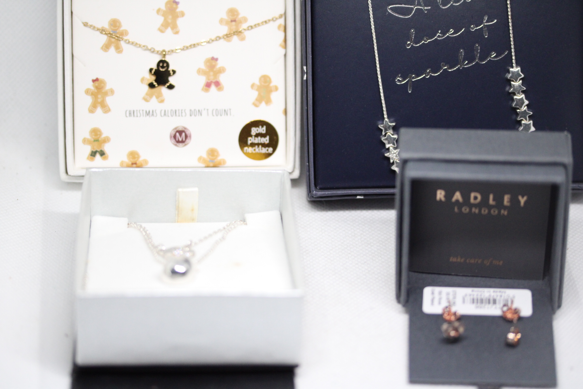 Collection of costume jewellery to include Radley earrings