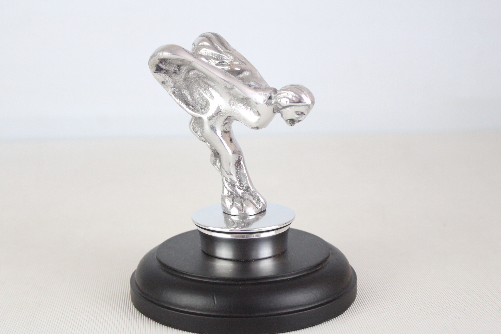 Chrome flying lady on base