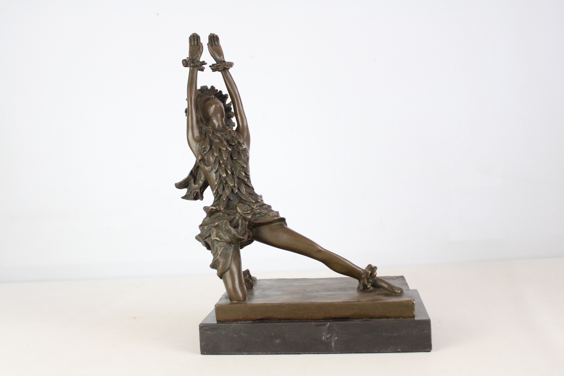 Bronze Hawawian Hula girl statue on marble base