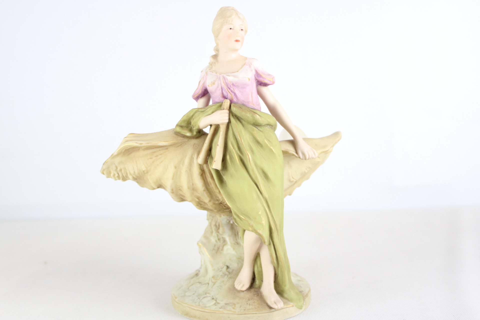 Royal Dux Bohemia Bisque Porcelain Figurine of a Woman with Flutes