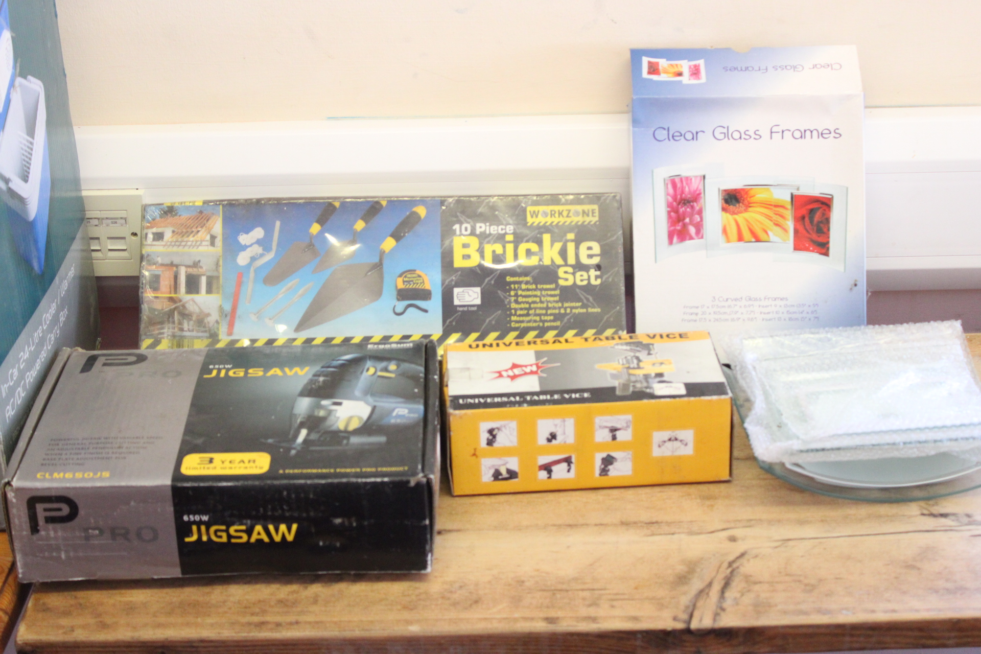 A Collection of Power Tools, Masonry Hand Tools, and Household Goods