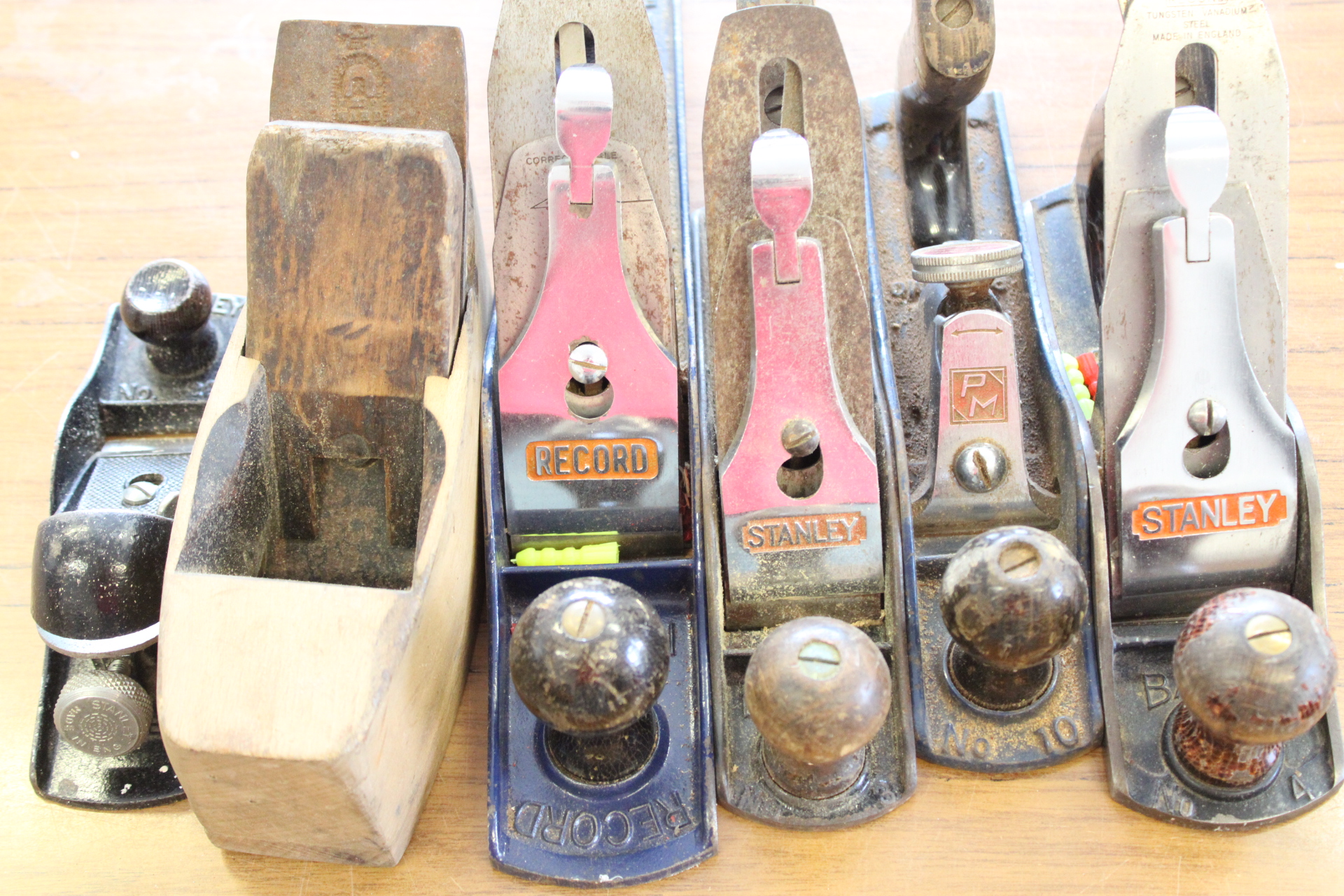 A Collection of Vintage Woodworking Hand Planes Including Stanley and Record Models
