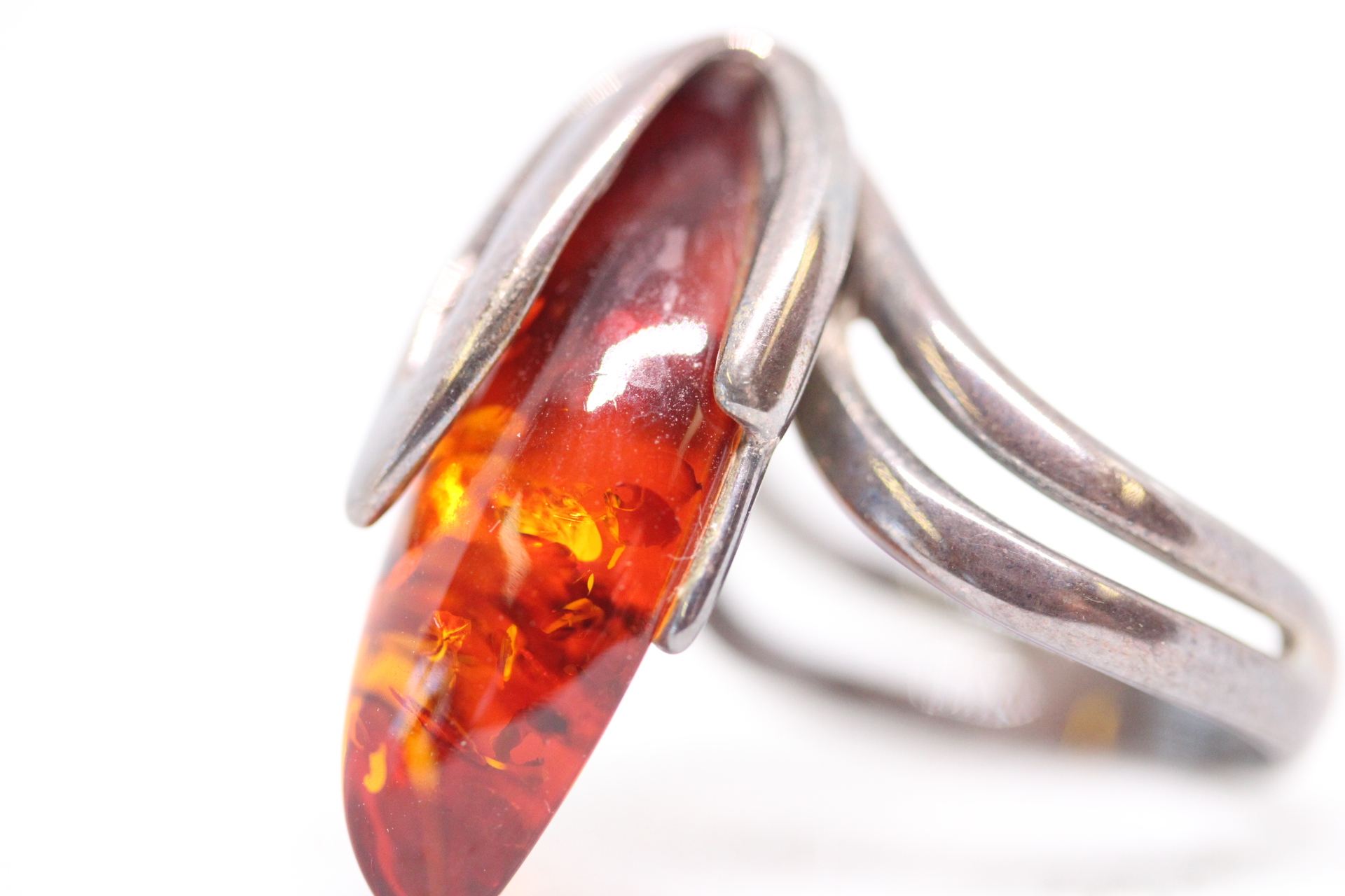 Silver ring set with amber