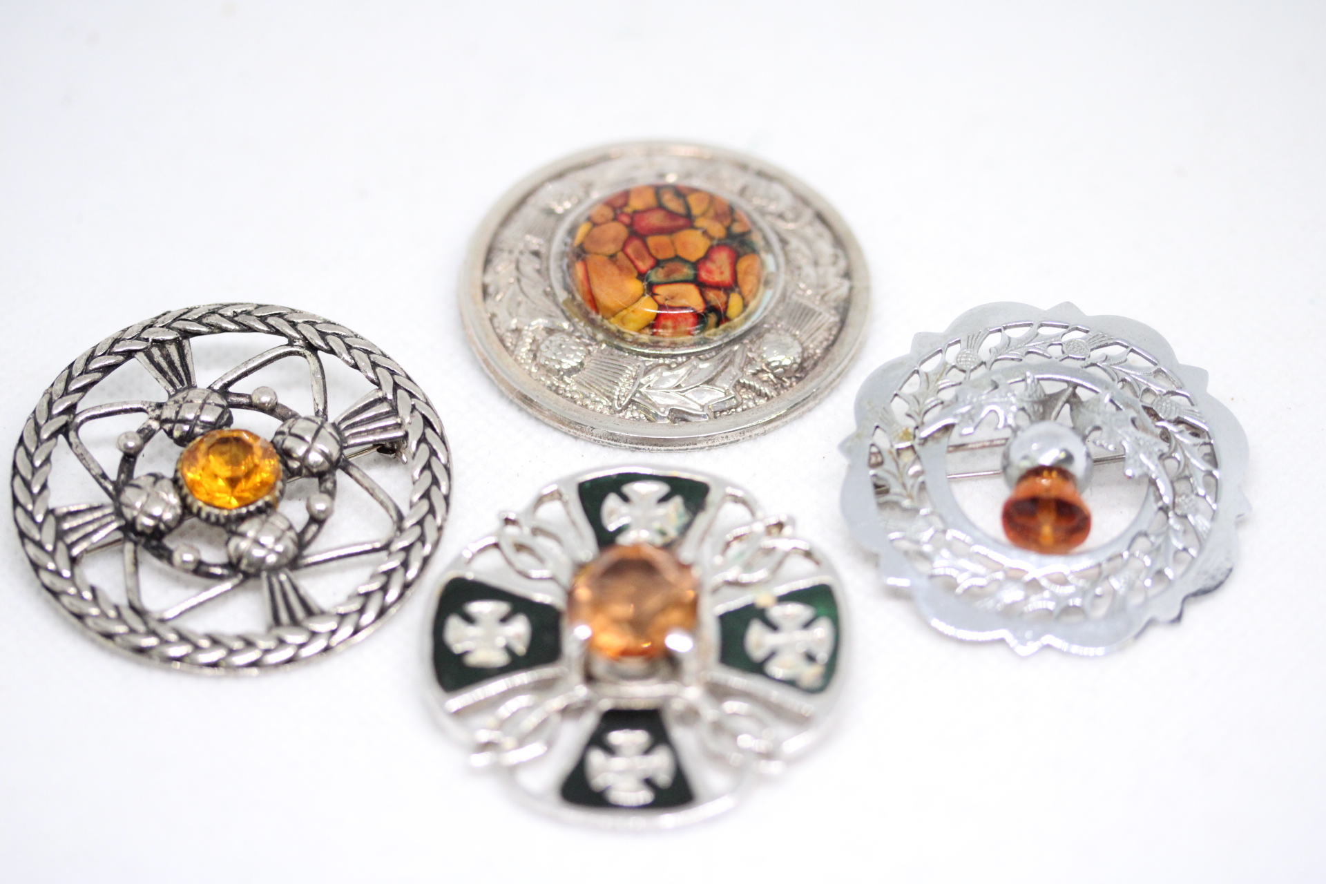 4 Scottish brooches