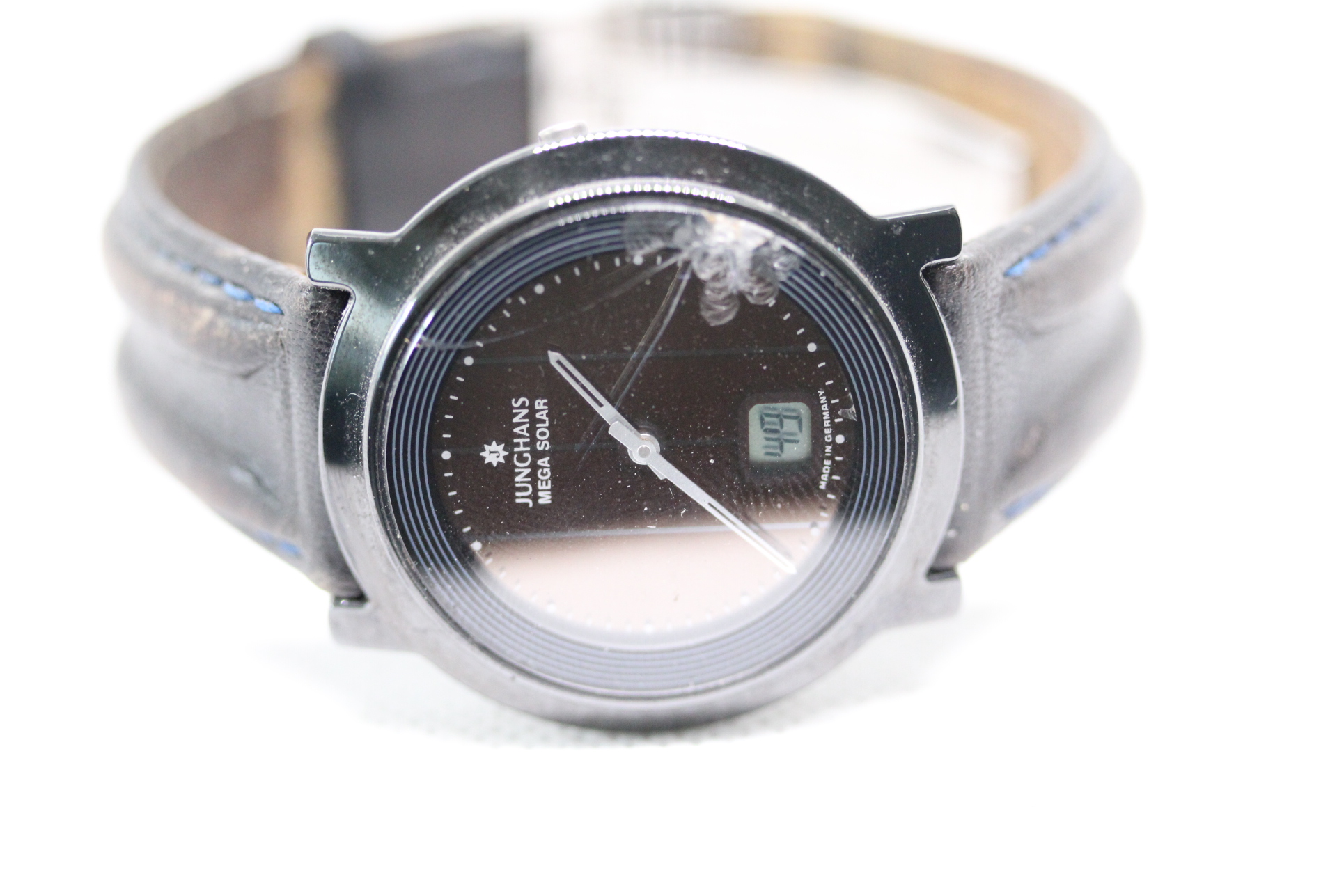 Gents Junghens Mega Solar Swiss Made Analogue and Digital Solar Powered Swiss Made Watch in Ceramic Case working but requires new Crystal.