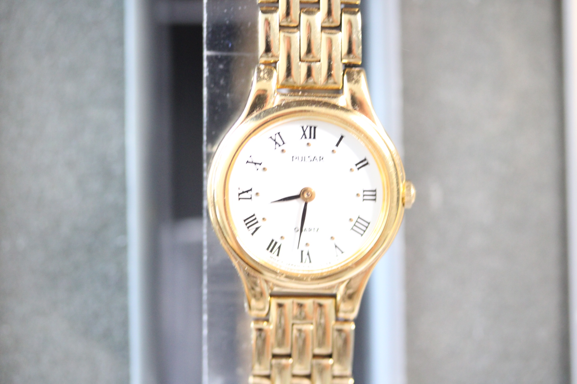 Ladies Pulsar Gold Plated Watch in Box.