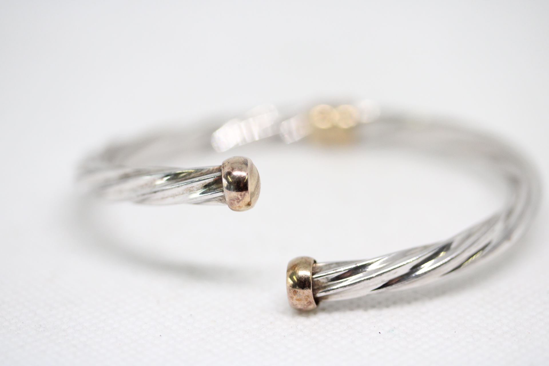 925 Silver designer bangle with yellow metal cuffs Weight 17.2g