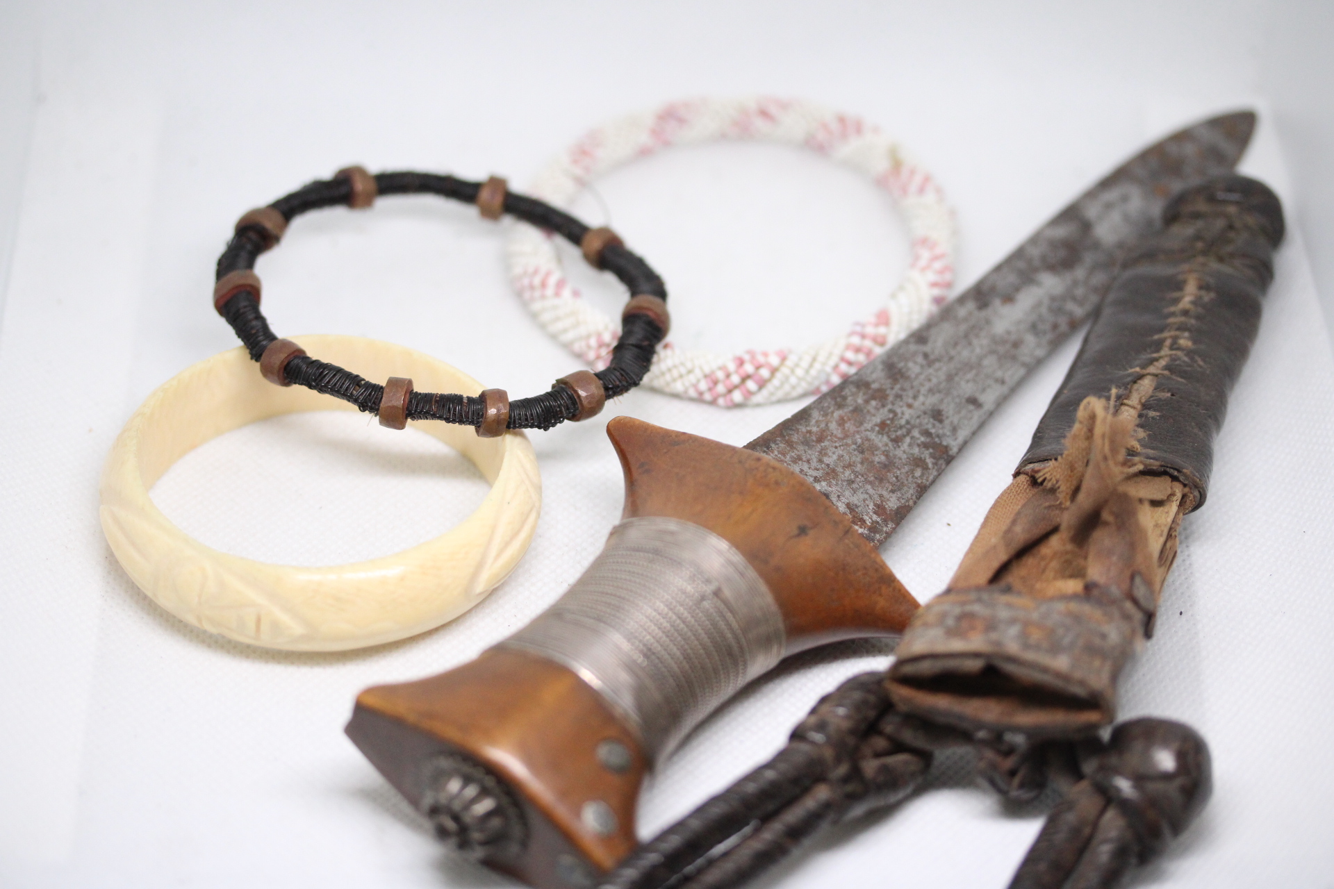Collection of 3 African bangles together with a Sudanese knife