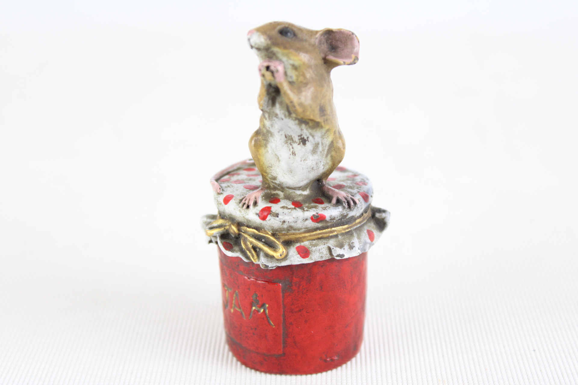 Cold painted bronze mouse in a jam pot