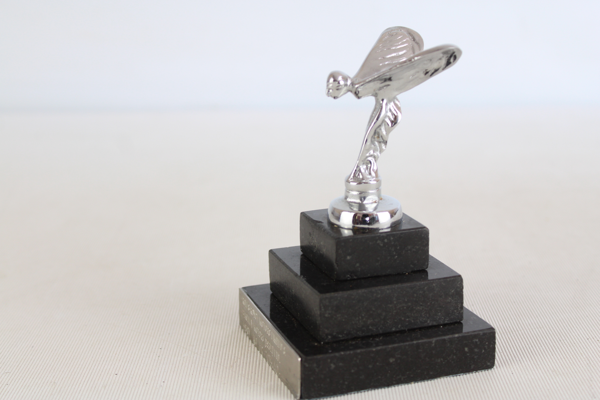 Chrome flying lady on marble base