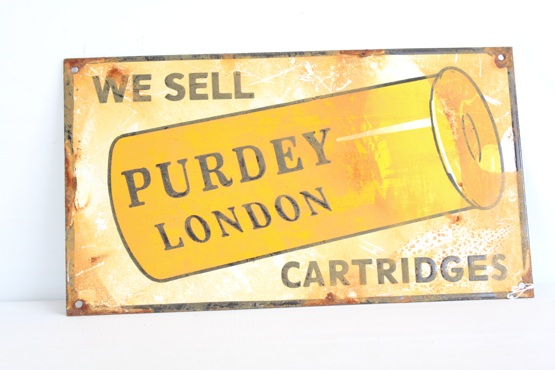 Enamel Purdey cartridges sign