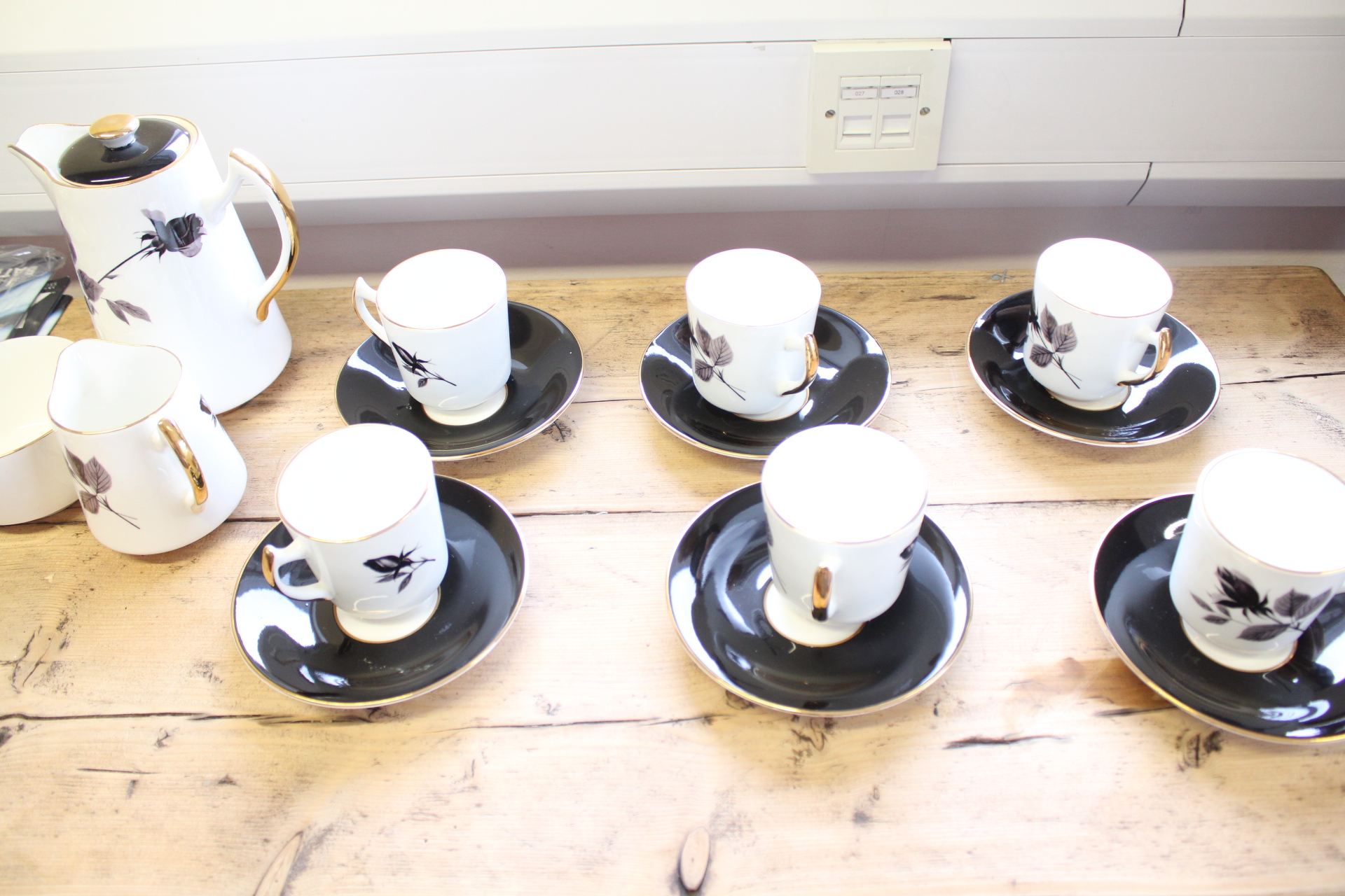 A 15-Piece Hudson and Middleton Sutherland Bone China Coffee Set
