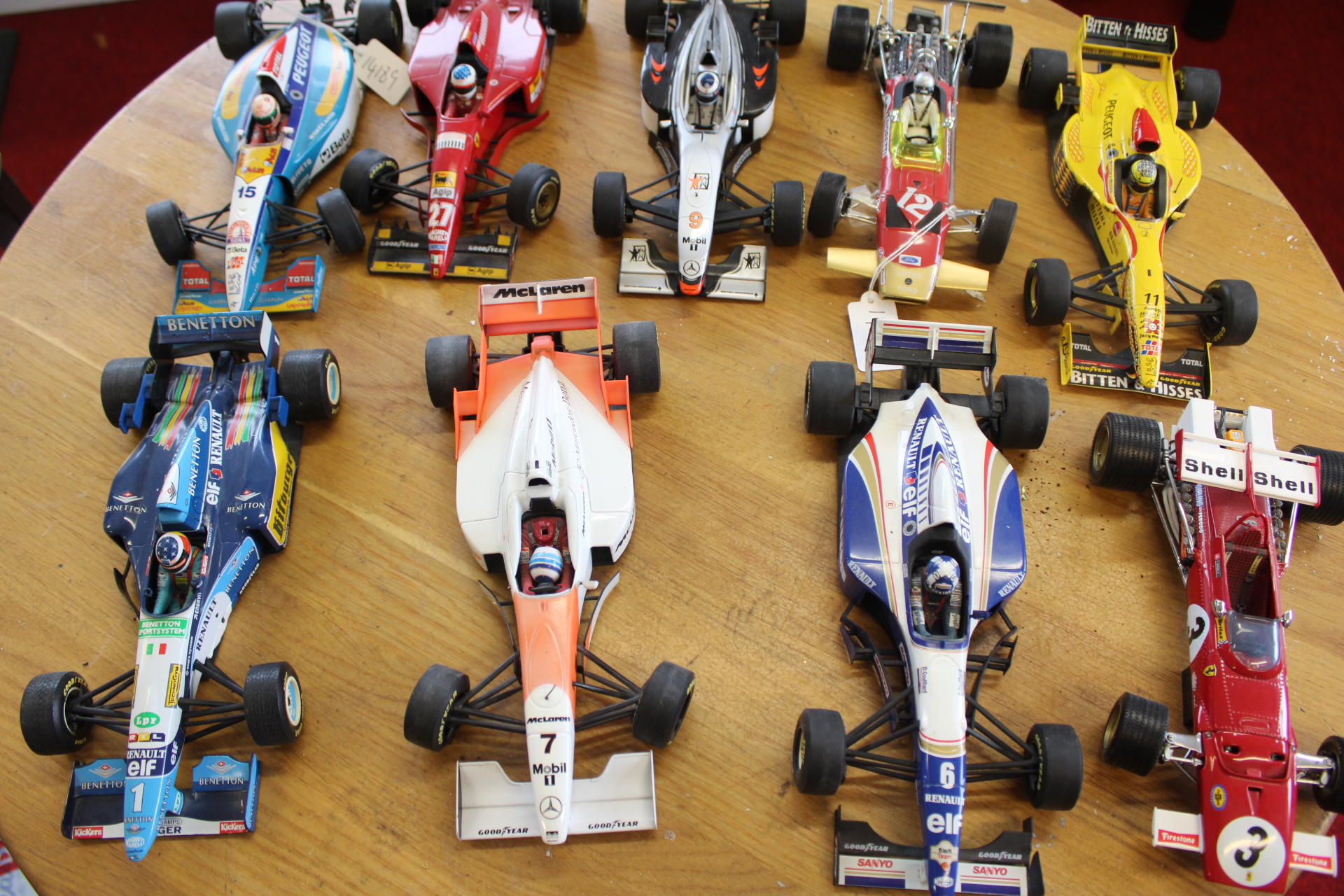 A Collection of Nine Minichamps 1:18 Scale Formula One Model Racing Cars
