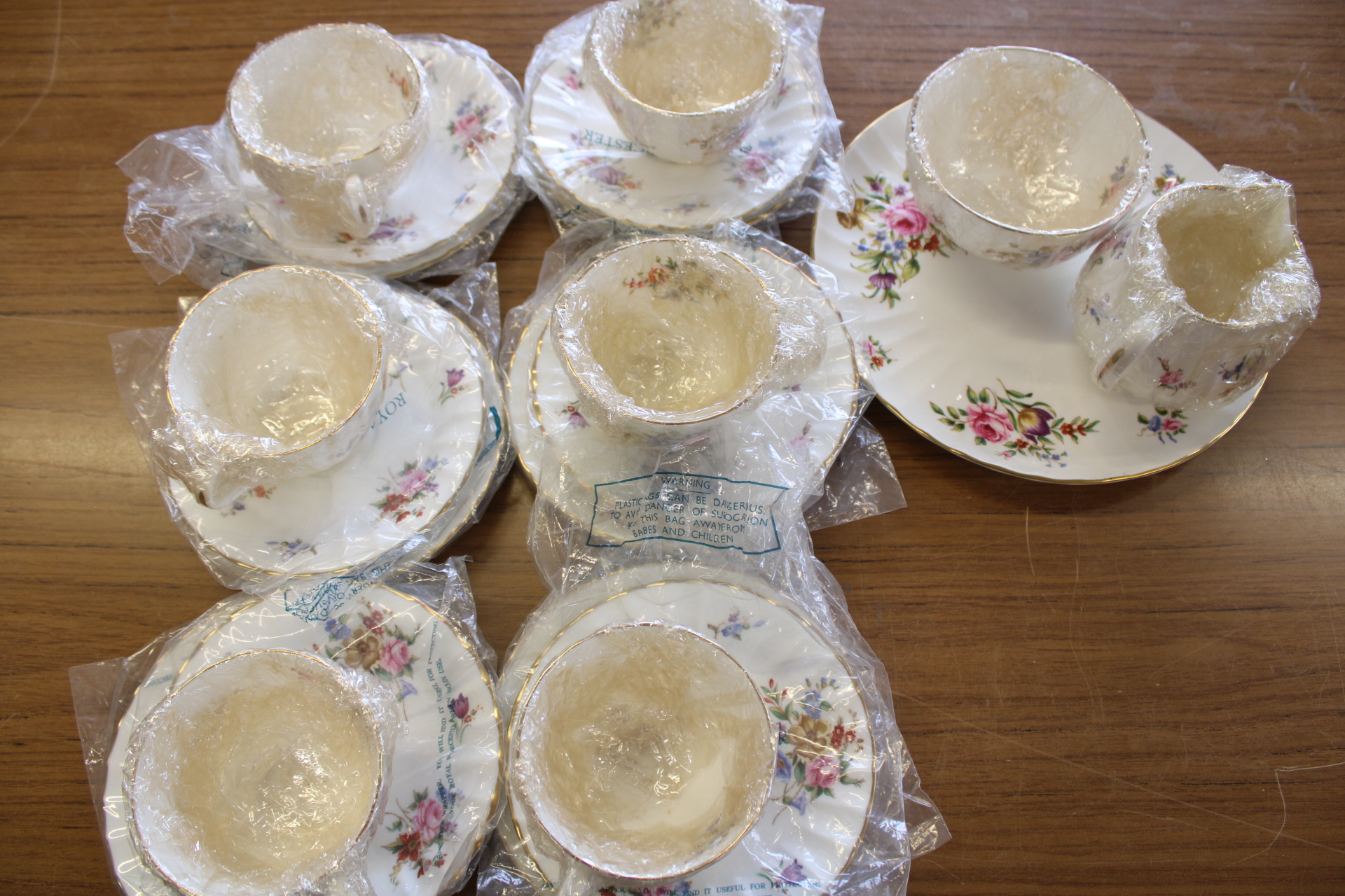 A Set of Royal Worcester Fine Bone China Tableware in the Roanoke Pattern