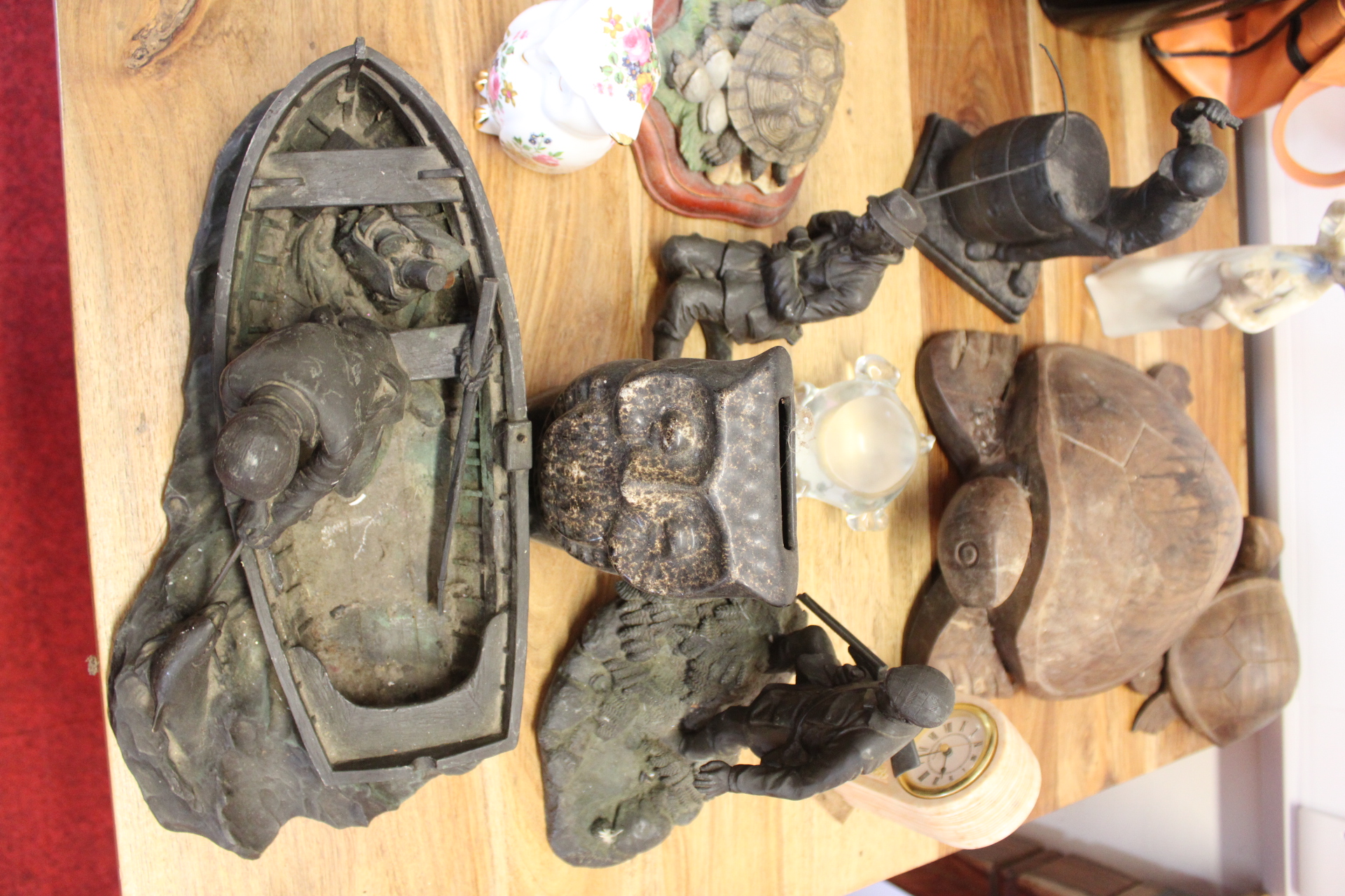 A Collection of Cast Metal, Wood, and Ceramic Decorative Figurines and Collectibles
