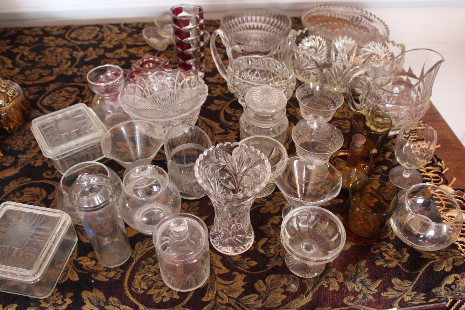 An Assortment of Vintage and Antique Glassware Including Cut Crystal and Pressed Glass