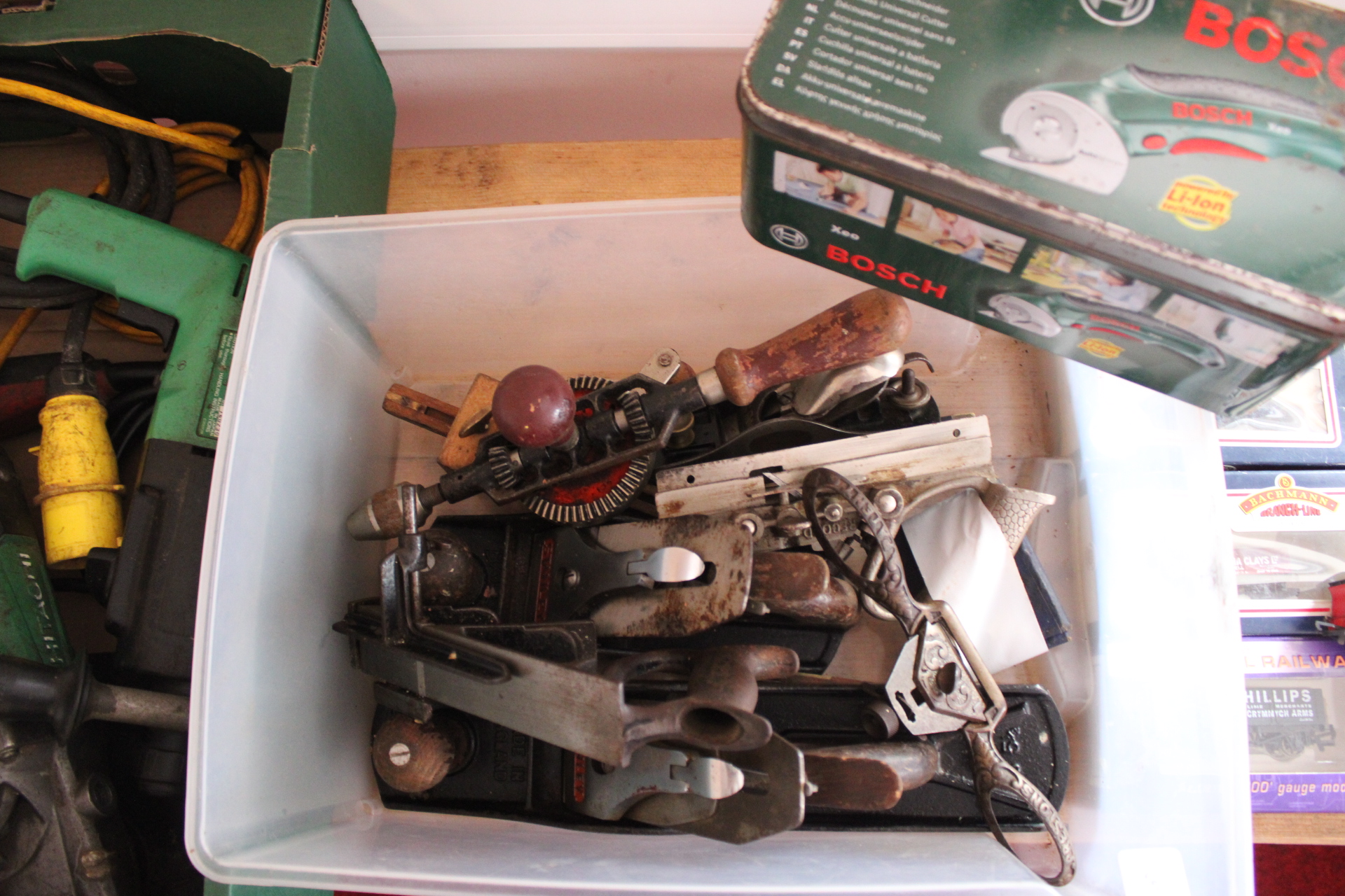 An Assortment of Vintage Woodworking Hand Tools and Metal Tin