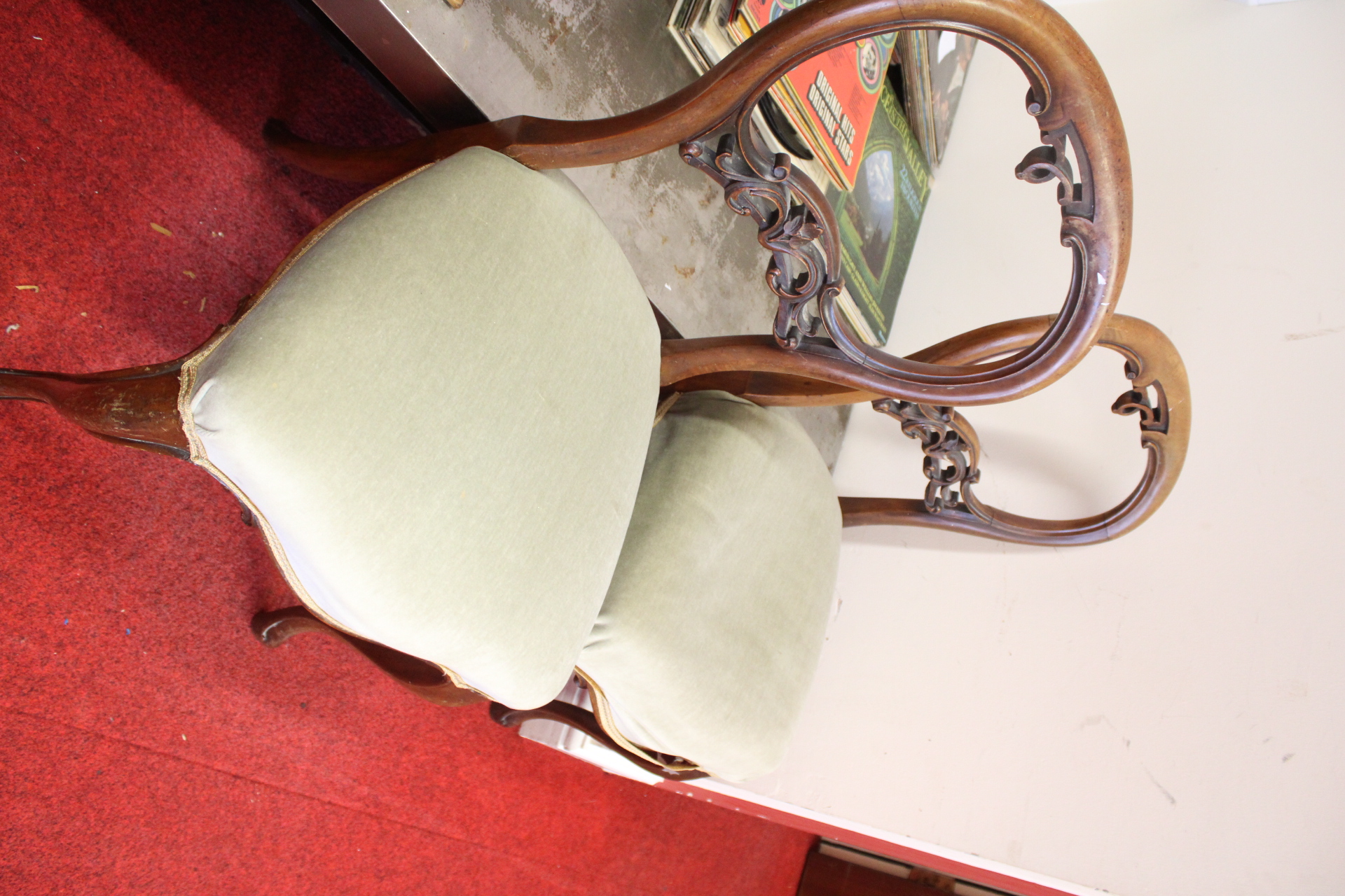 A Pair of Victorian Walnut Balloon Back Side Chairs
