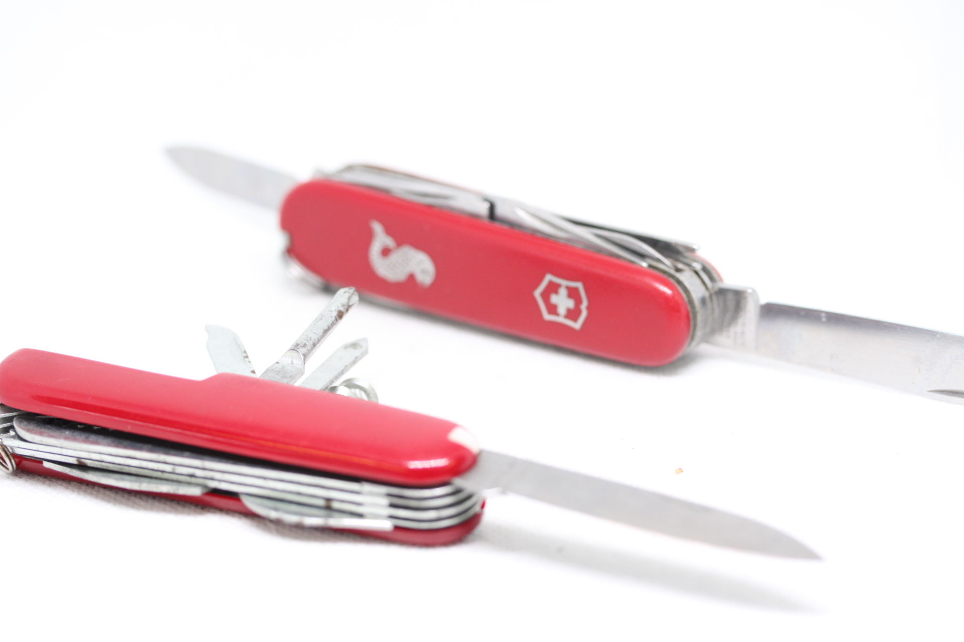 Victorinox angler & 1 other Victorinox