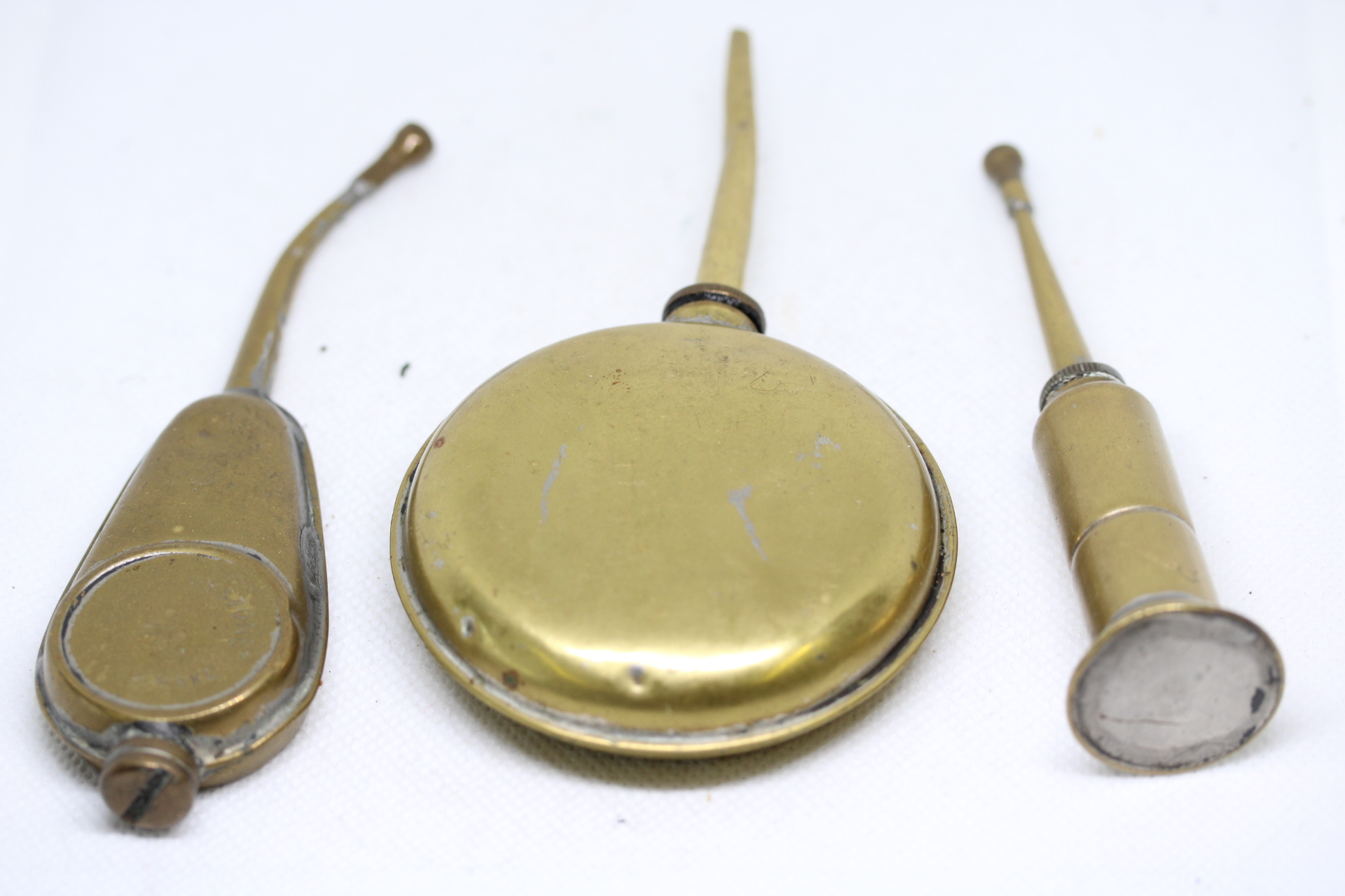 3 Miniature oil cans