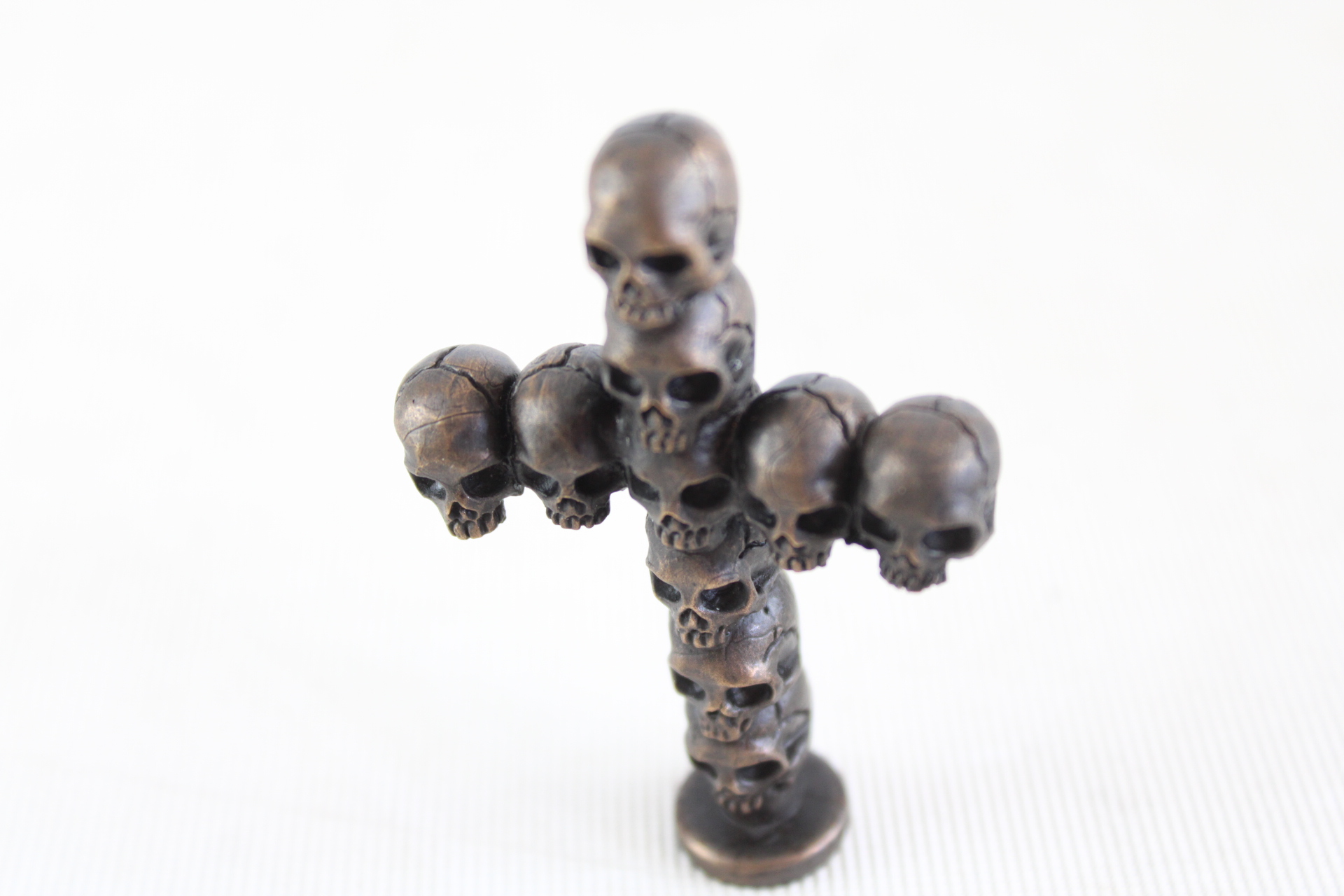 Bronze cross skulls