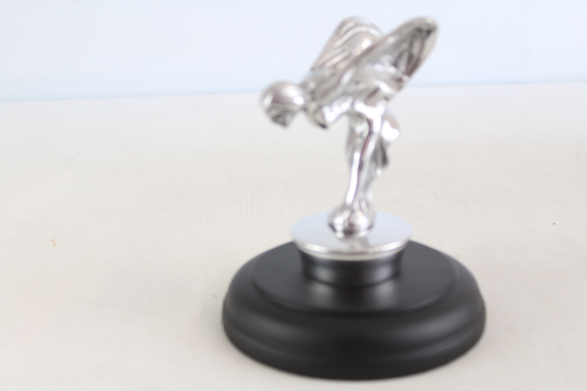 Chrome flying lady on base