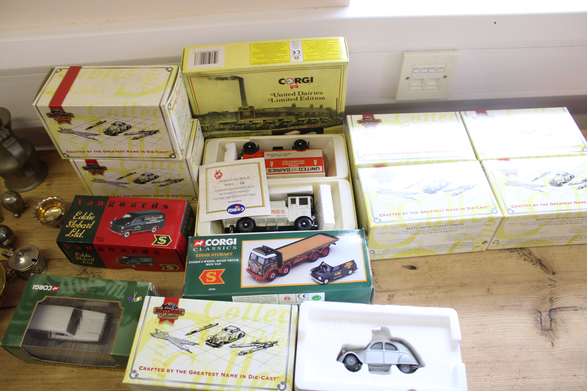 A Collection of Corgi Classics, Matchbox Collectibles, and Vanguards Die-Cast Model Vehicles